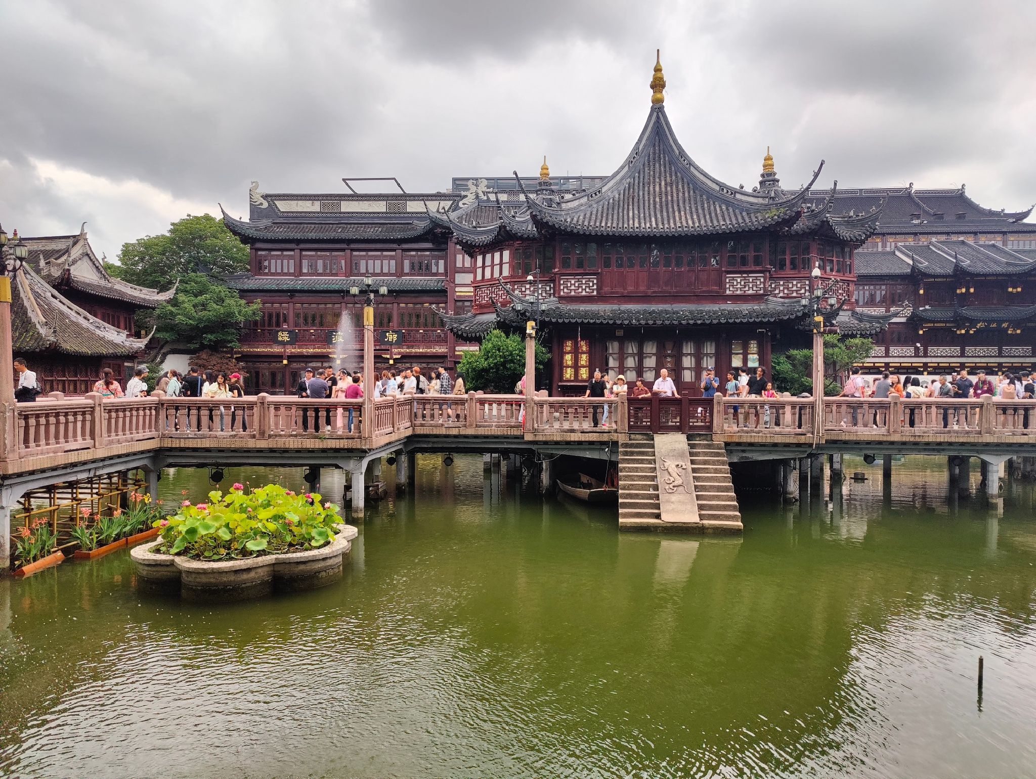 Huxinting Teahouse in Shanghai’s Yu Garden reflected in a peaceful lotus pond.