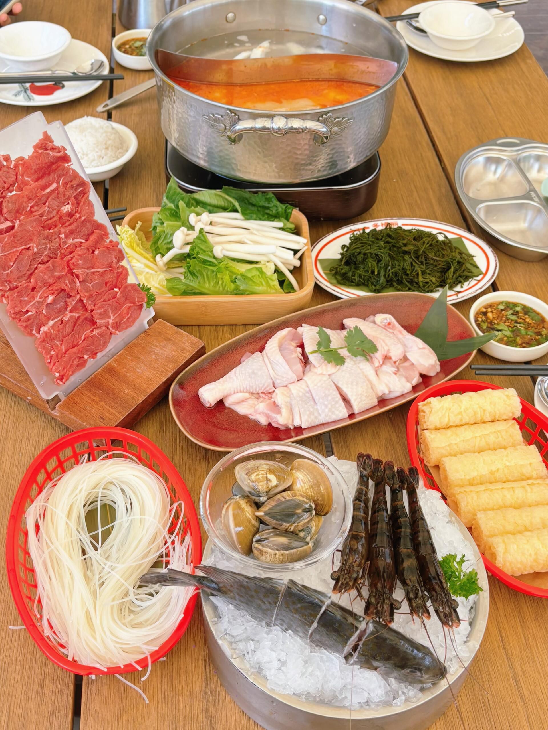 多橘丽-海南糟粕醋火锅(万宁王府井店)