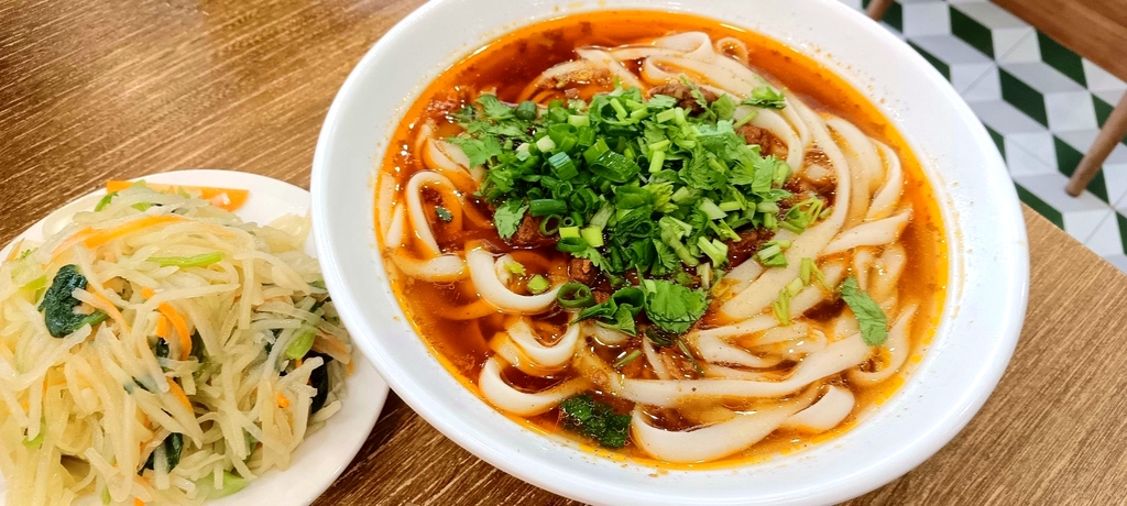 食晋欢大同刀削面
