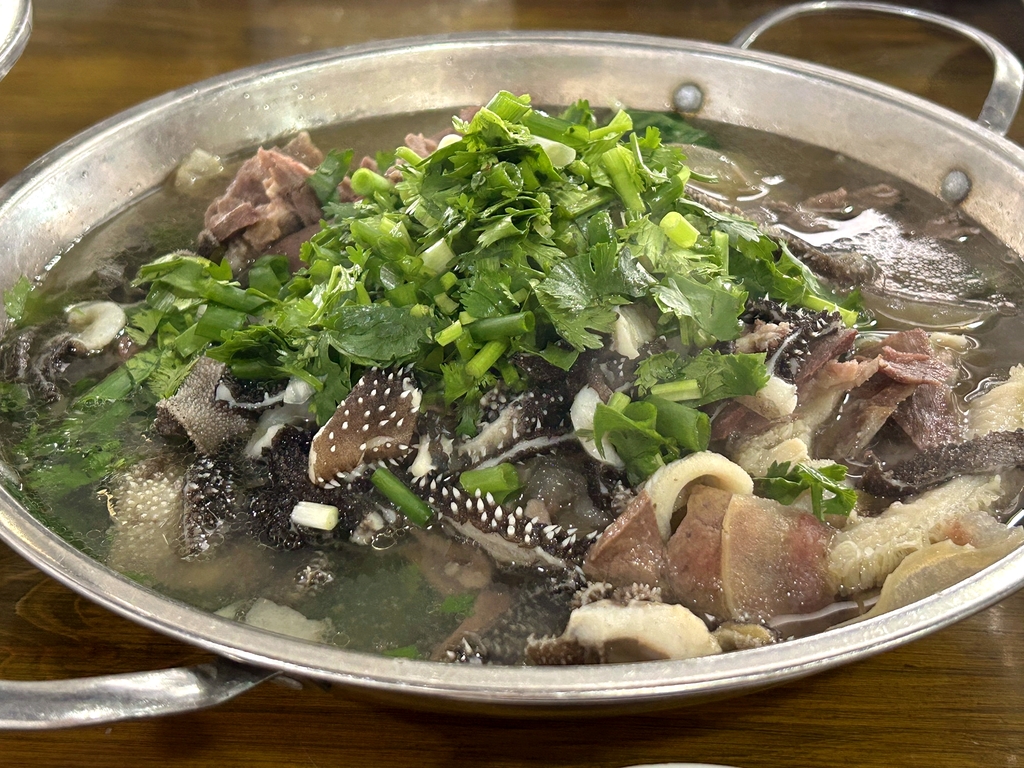 周飘子跷脚牛肉